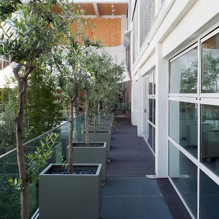 فندق ماجنا باريس 1 هوتل إيه بارفوم ميلان المظهر الخارجي الصورة The interior of the building