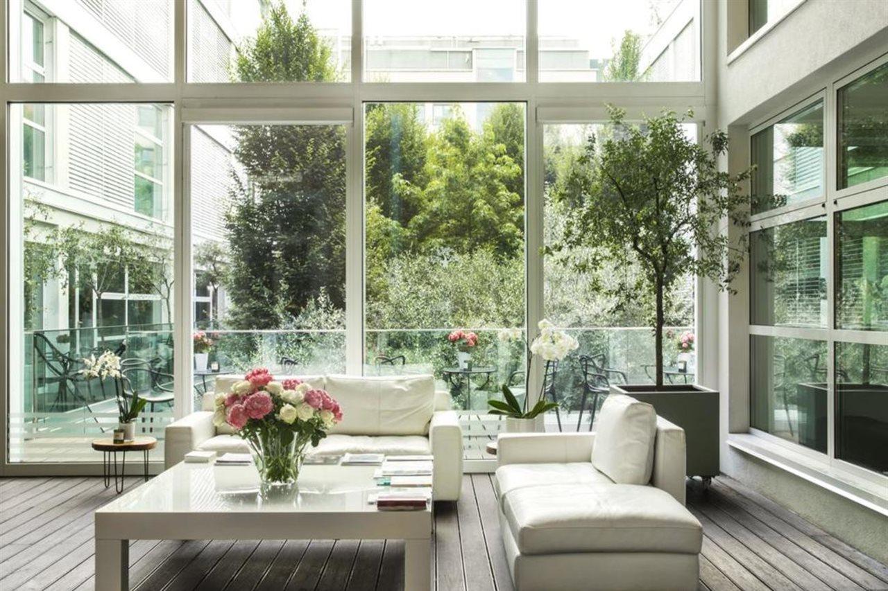 فندق ماجنا باريس 1 هوتل إيه بارفوم ميلان المظهر الخارجي الصورة Interior of the house