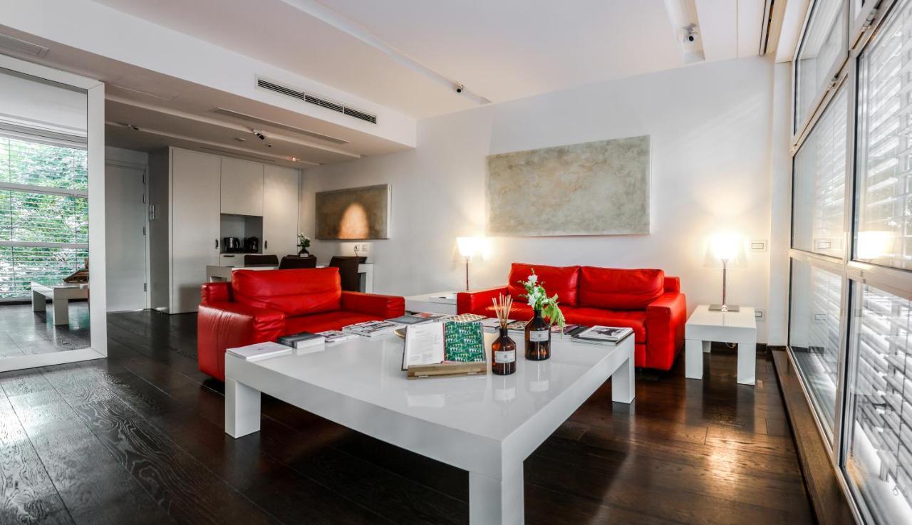 فندق ماجنا باريس 1 هوتل إيه بارفوم ميلان المظهر الخارجي الصورة A living room in a serviced apartment in Vienna, Austria