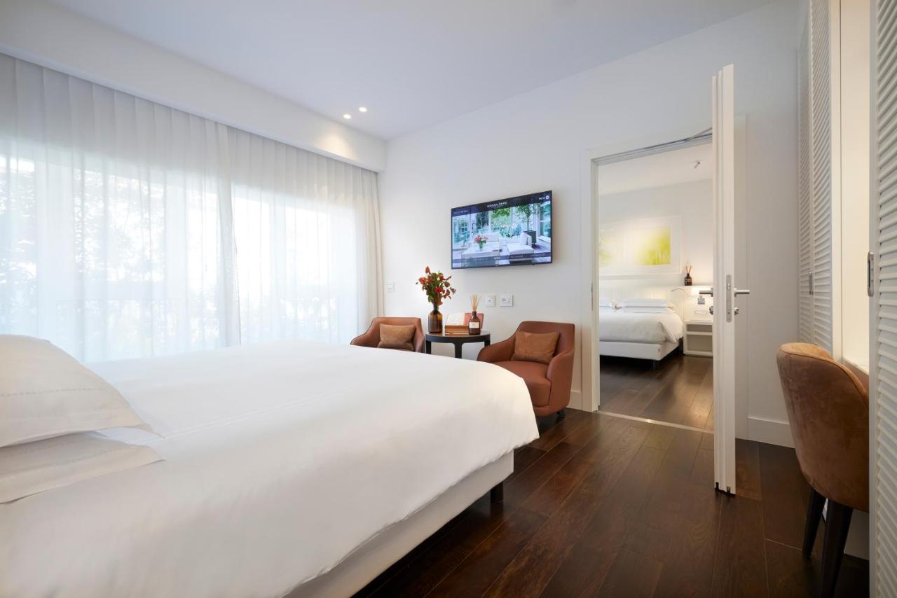 فندق ماجنا باريس 1 هوتل إيه بارفوم ميلان المظهر الخارجي الصورة A room at the hotel